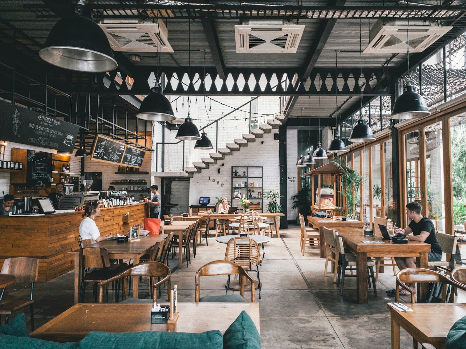 Soft cafe interior light — membership and pricing mood